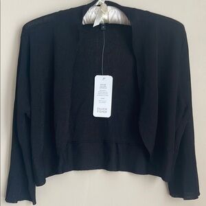 Eileen Fisher shrug with elbow-length sleeves.
NWT black size M.